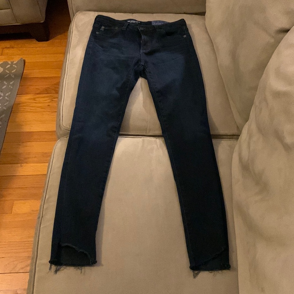 Women’s AG Adriano Goldschmied High Rise Skinny Jeans. Frayed, diagonal hem. 26R
